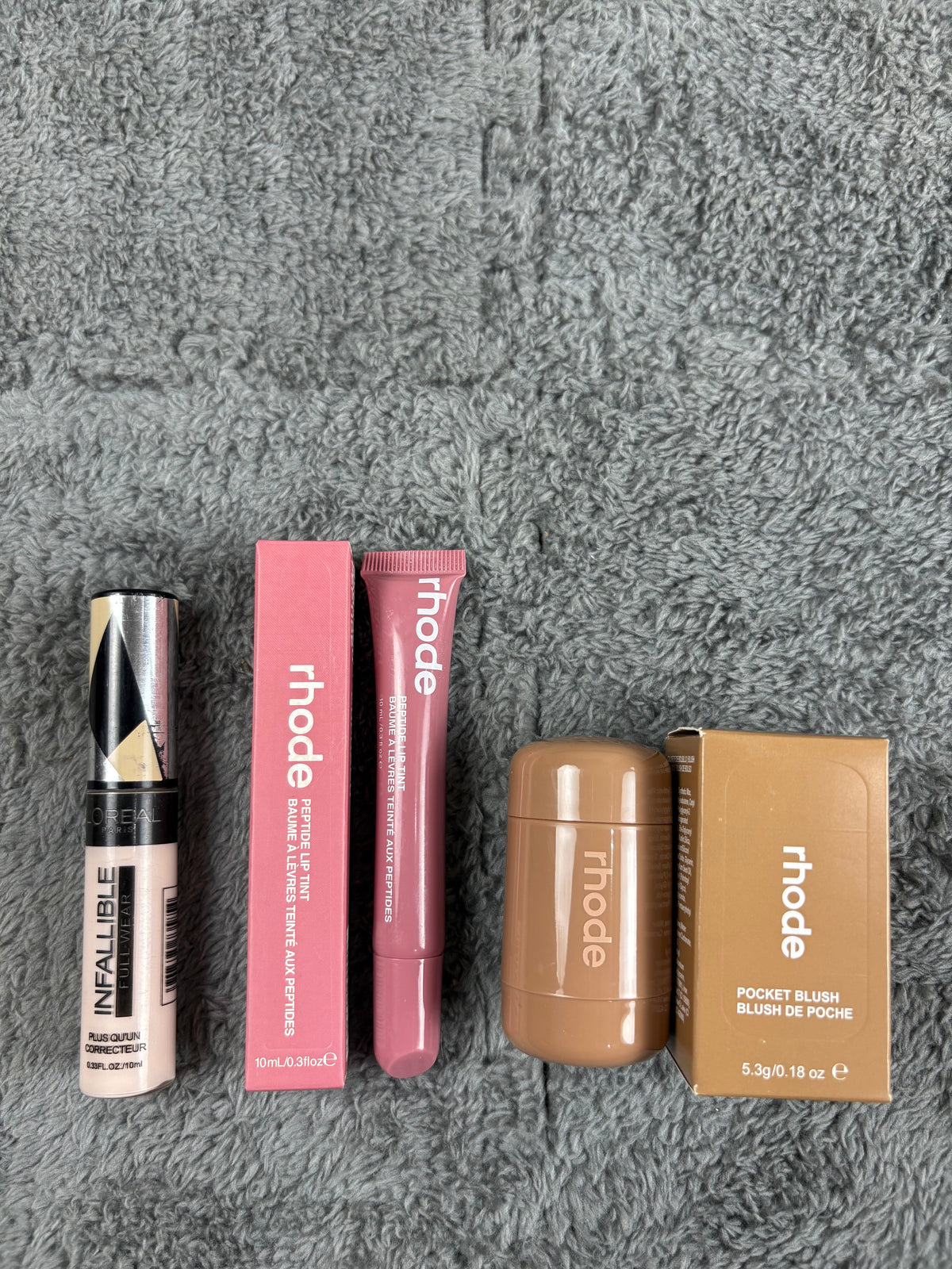 Rhode blush | rhode lipgloss | loreal infallable concealer  ( shades confirmed through whatsapp) u will receive msg after placing order