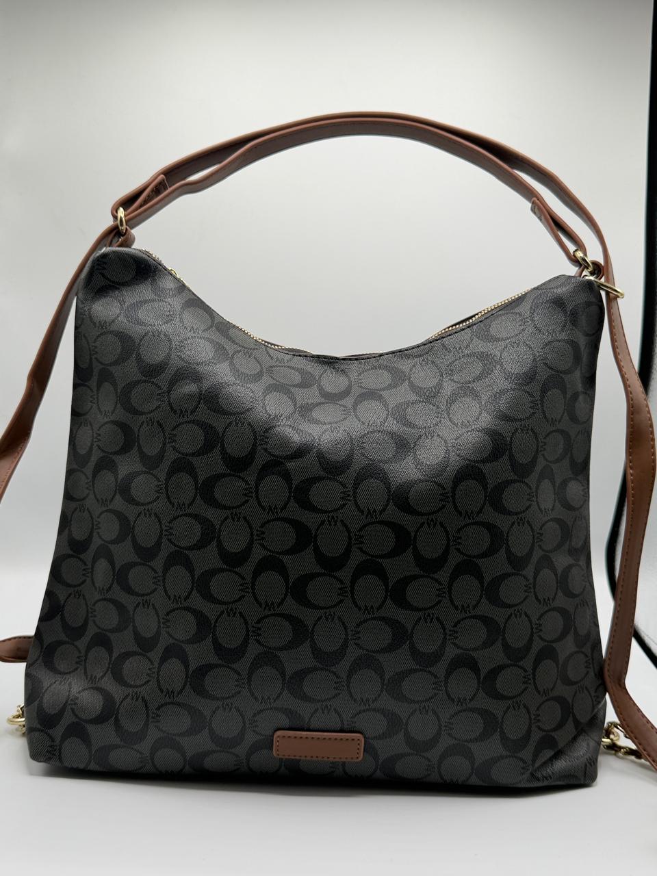Coach- carry and shoulder bag